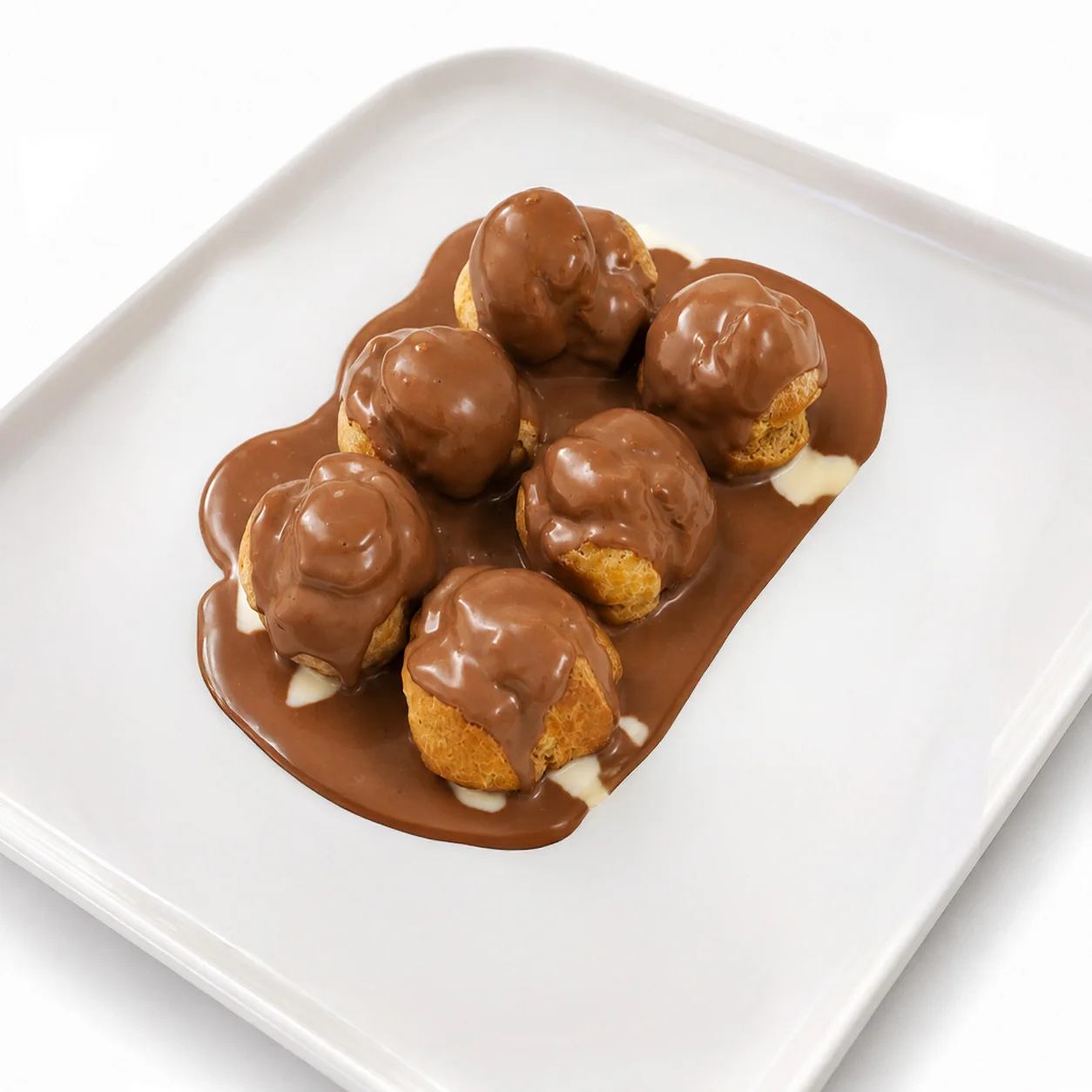 Sütlü çikolatalı profiterol sunumu